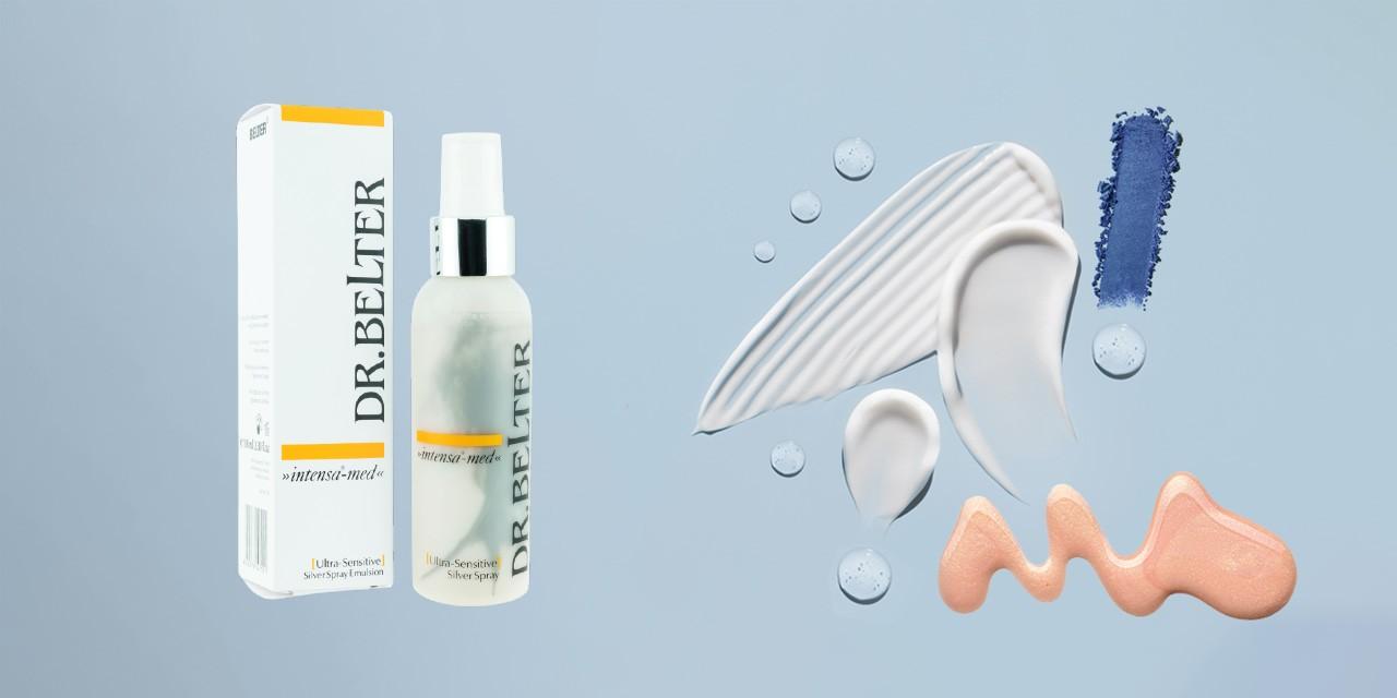 Das Produkt Dr. Belter Silver Spray vor blauem Hintergrund und neben diversen Farbkleksen.