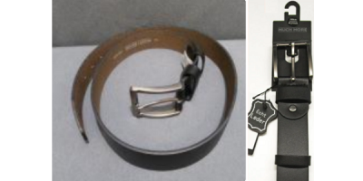 Schwarzer Ledergürtel zusammengeringelt von der Seite und Ende mit Schnalle
