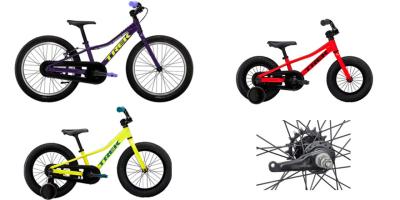 3 Kinderfahrräder von Trek. 2 davon mit Stützrädern. Eine Nahaufnahme einer Rücktrittbremse an der Nabe eines Laufrades.