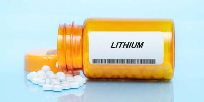 Lithium-Tabletten in einer orangen Dose