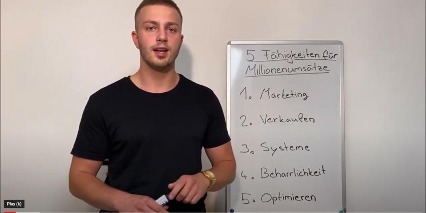 YouTube video screenshot of Coach Daniel Igl in front of a flipchart