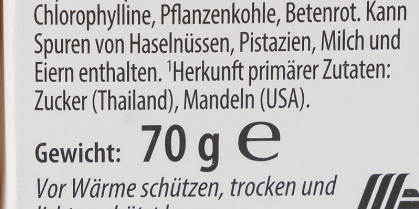 Etikettaufschrift mit Herkunftsangabe der primären Zutaten: Zucker aus Thailand und Mandeln aus den USA