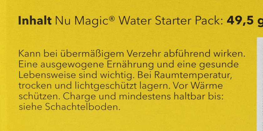 Nu Magic Water: schwarze Schrift auf gelbem Untergrund mit Info zum Produkt u. Preisangabe
