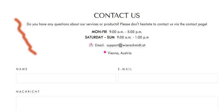 Screenshot zeigt die nur teilübersetzte Kontaktseite von wienschmidt.at
