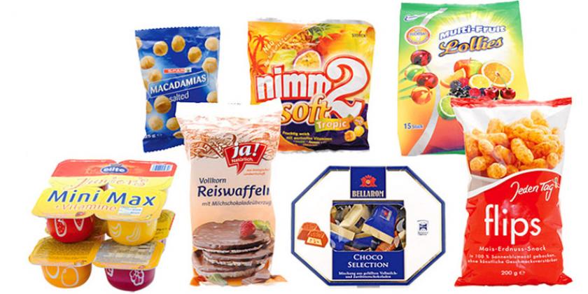 Spar Macadamias, Storck Nimm2 Soft Tropic, Emotionalie Multi-fruit Lollies, Jeden Tag Flips, ja! natürlich vollkorn reiswaffel mit Milchschokoladeüberzug, Bellarom Choco Selection, Elite Quark Juniors Mini Max (Bild: VKI)