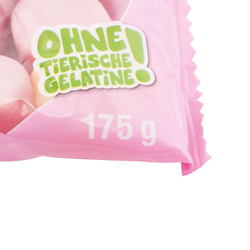 Die Auslobung der Katjes Yoghurt Gamus in weißer Schrift auf rosa Hintergrund.