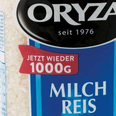 Die Auslobung der Mengenänderung auf der Verpackung des Oryza Milchreis. 