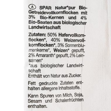 Die Zutatenliste der Bio-Porridge-Basis von Spar Natur pur in schwarzer Schrift vor weißem Hintergrund.