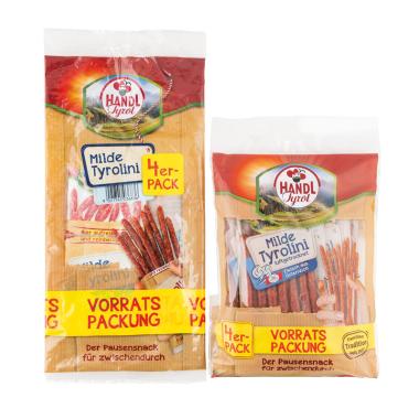 Die alte und neue Verpackung der Handl Tyrol Milde Tyrolini im Vergleich nebeneinander vor weißem Hintergrund. 