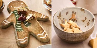 Emailliertes Servierbrett in Form eines Lebkuchenmanns, darauf liegen kleine Stücke Gebäck. Daneben eine beige Keramikschale mit weihnachtlichen Motiven wie Sternen und Häschen, gefüllt mit sternförmigen Keksen. Beides steht auf einem hellen Holztisch in gemütlicher Atmosphäre.
