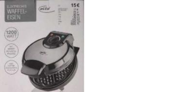 Eine Seite der Kartonverpackung eines darauf abgebildeten elektrischen Waffeleisens in Grautönen