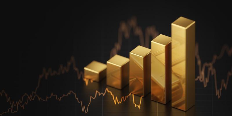Gold kaufen - Edelmetall als Anlage: Fotografik mit Balkendiagramm aus Gold