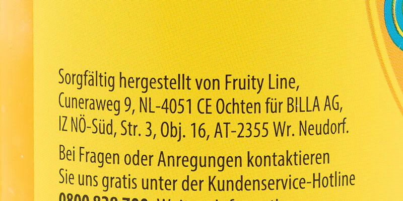 Herkunftshinweis auf der Flasche Billa immer gut Sunny Orange in schwarzer Schrift auf gelbem Hintergrund. 