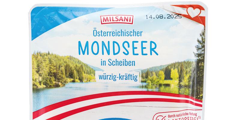 Das Verpackungsdesign des Milfina Mondseer Käseaufschnitts. Abgebildet ist eine Seenlandschaft. 