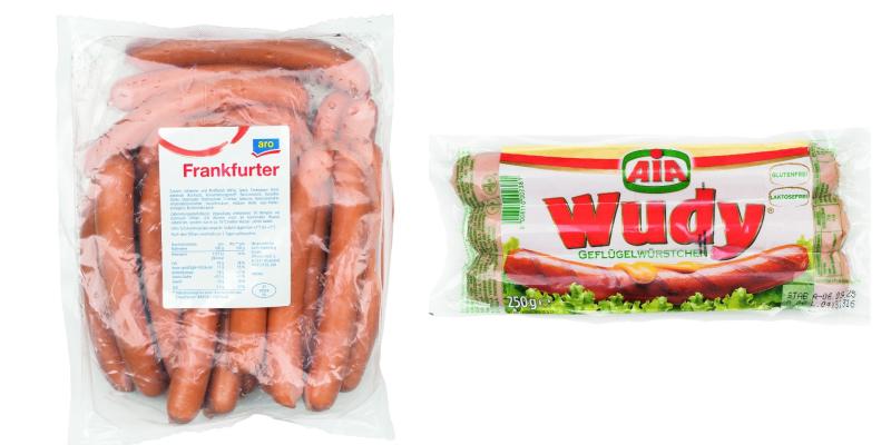 Zwei Packungen Frankfurter der Marken Aro und Wudy vor weißem Hintergrund.