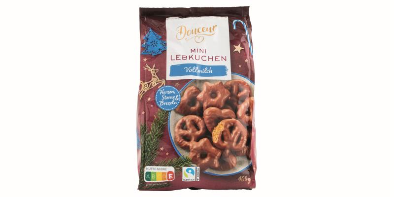 Glanzpapierbeutel mit vielen abgebildeten mit Milchschokolade überzogenen Lebkuchen in den Formen Herz, Breze und Stern