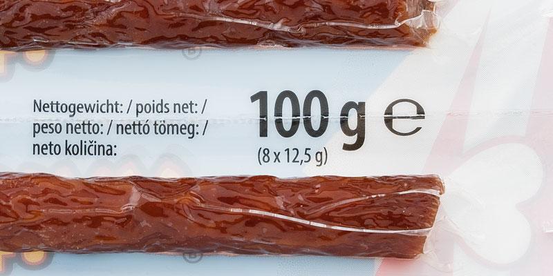 Die Auslobung der Füllmenge auf der Verpackung der Snack Stixx in schwarzer Schrift auf weißem Hintergrund. 