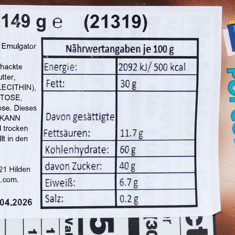 Nährwerttabelle je 100 Gramm: Energie 2.092 Kilojoule beziehungsweise 500 Kilokalorien, Fett 30 Gramm, davon gesättigte Fettsäuren 11,7 Gramm, Kohlenhydrate 60 Gramm, davon Zucker 40 Gramm, Eiweiß 6,7 Gramm, Salz 0,2 Gramm.